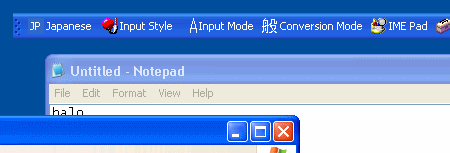 Language bar pada Windows XP yang melayang bebas Language bar pada Windows XP yang melayang bebas